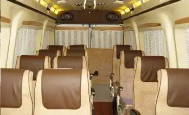12 Seater Luxury Maharaja Tempo Traveller