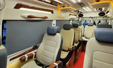 9 Seater Luxury Maharaja Tempo Traveller